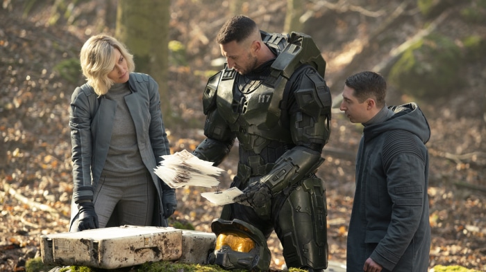 Master Chief and two people in a forest