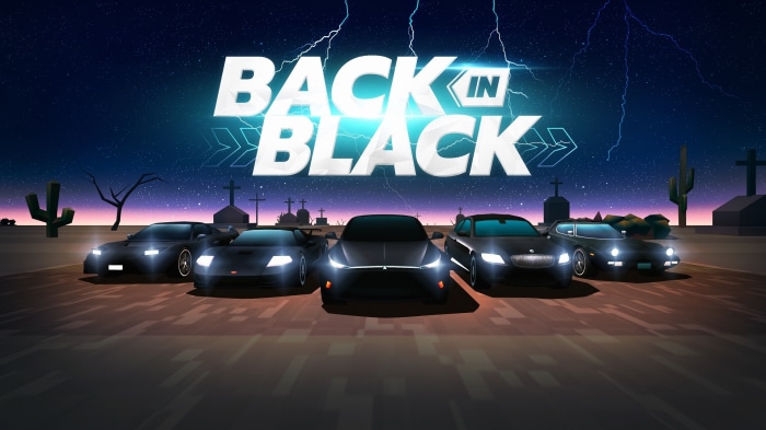 Back in Black cars in a desert graveyard