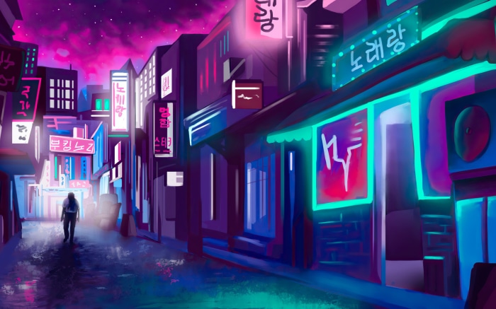Person walking down a neon-lit street at night
