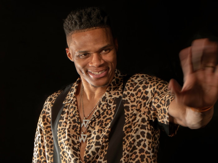Russell Westbrook wearing a leopard print shirt