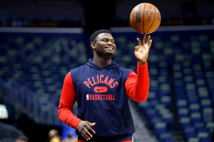 Zion Williamson spinning a basketball