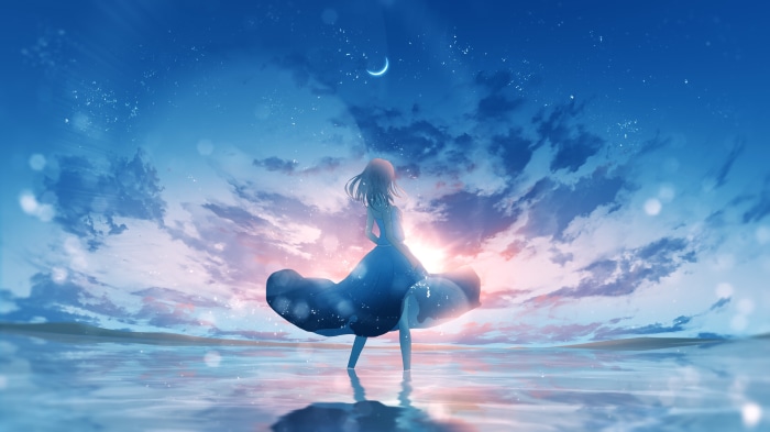 Girl in blue dress by the water at sunset