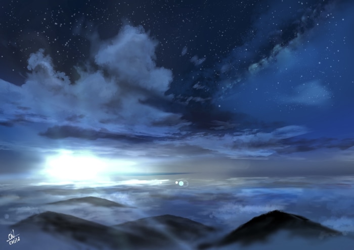 Night sky with stars and clouds over mountains