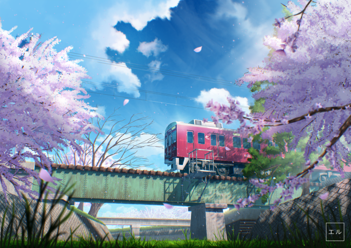 Red train on a bridge surrounded by cherry blossoms