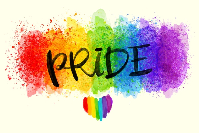 Pride text with rainbow watercolor splash and heart