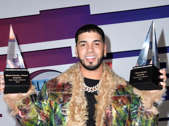 Anuel AA holding Latin American Music Awards