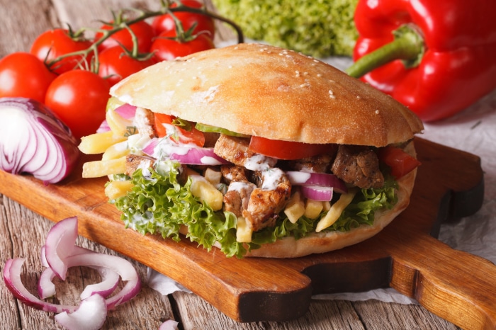 Doner Kebab Sandwich with Fries and Vegetables