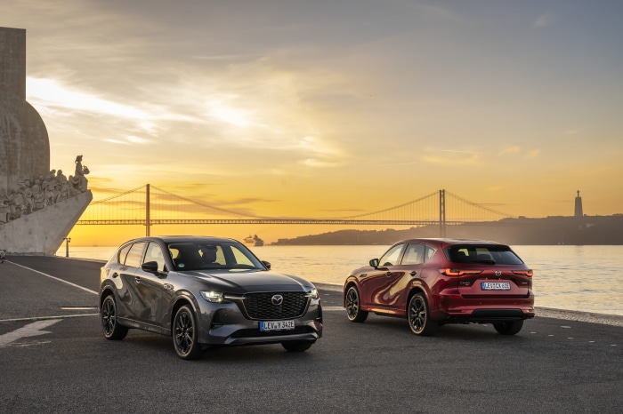 Mazda CX-60 cars at sunset with bridge