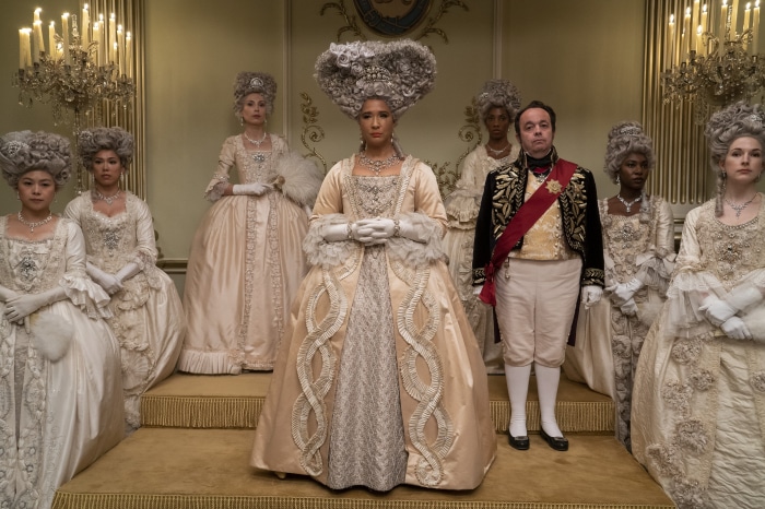 Bridgerton characters in elaborate costumes