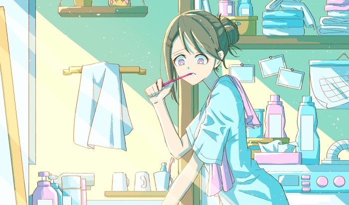 Girl brushing teeth in a bright bathroom