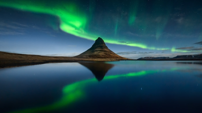 Kirkjufell mountain under Aurora Borealis in Iceland