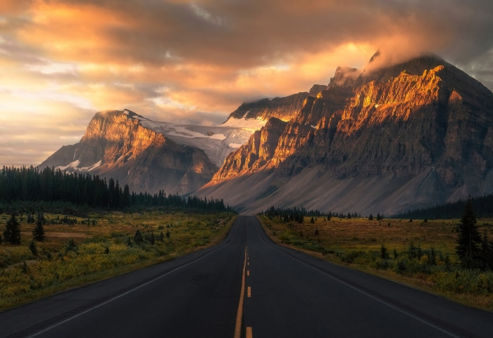 Road leading to mountains in Banff National Park, Canada
