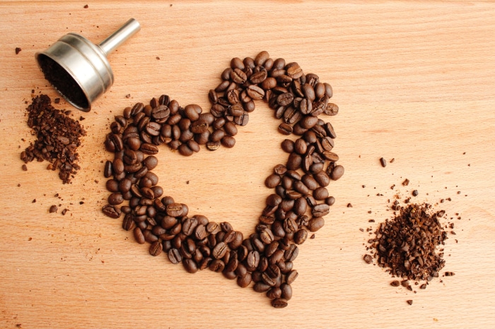 Heart-shaped coffee beans with a funnel