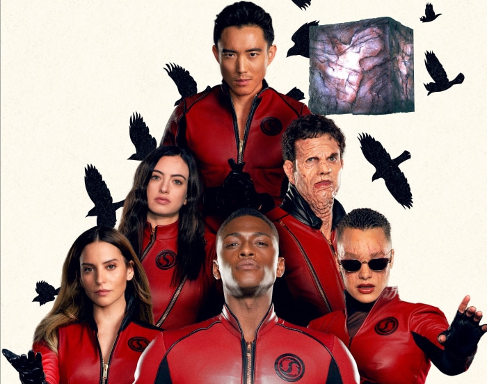 The Umbrella Academy characters with birds and cube