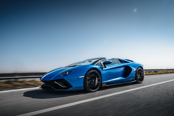Blue Lamborghini Aventador LP 780-4 Ultimae driving on road 4K