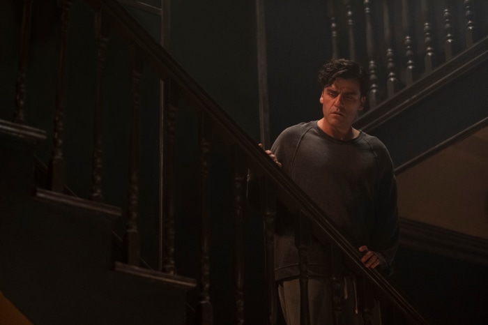 Marc Spector from Moon Knight on stairs