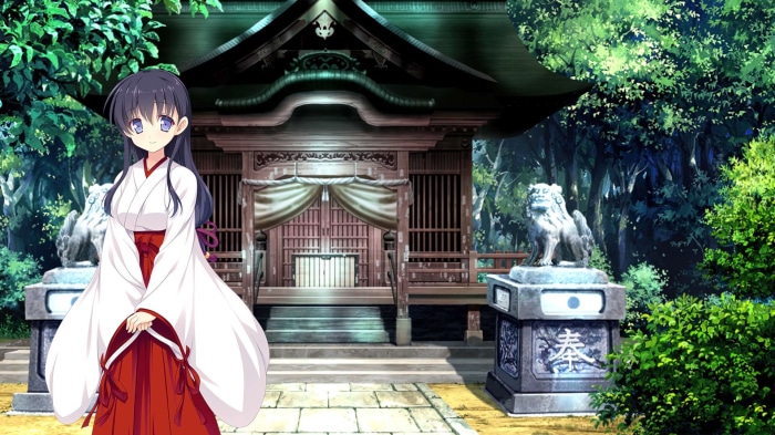 Miko in front of a Japanese Shrine