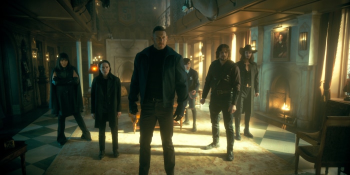 The Umbrella Academy characters in a room
