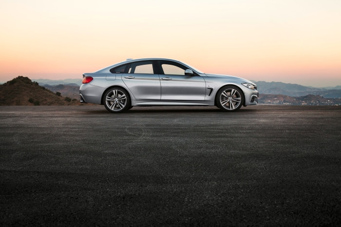 Silver BMW 4 Series Gran Coupé on asphalt
