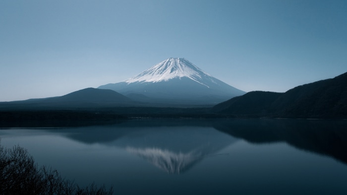 Mount Fuji reflected in a calm lake