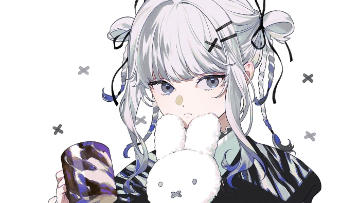 Girl holding a stuffed bunny and a cup