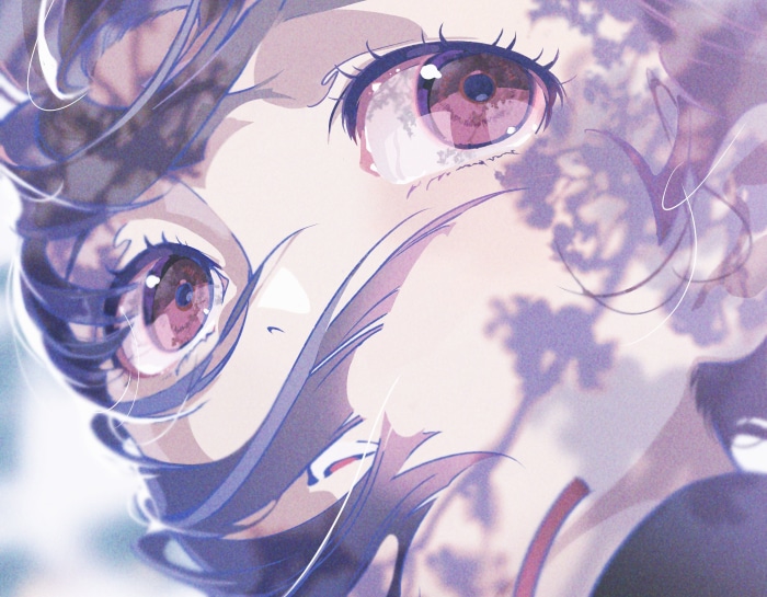 Close-up of a girl's eyes with tree shadows