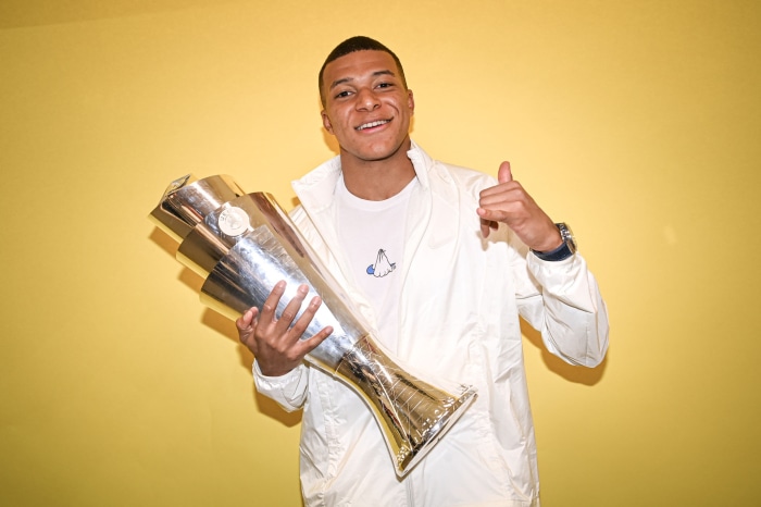 Kylian Mbappé Holding Trophy