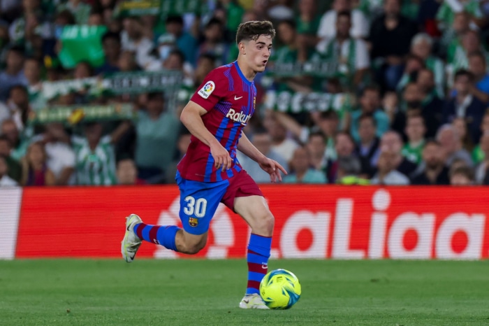 Gavi playing soccer for Barcelona