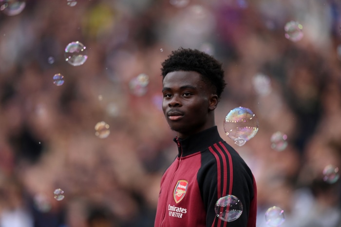 Bukayo Saka from Arsenal F.C. with bubbles