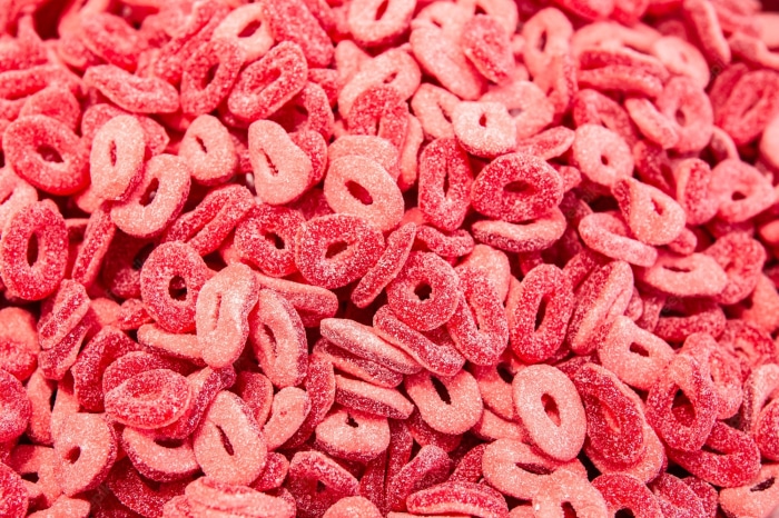 Pile of red sour ring candies