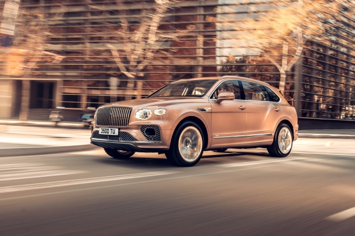 Bentley Bentayga EWB driving on city street 4K