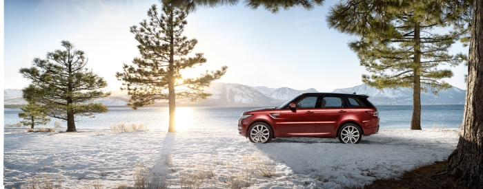 Red Range Rover Sport 4K by a snowy lake