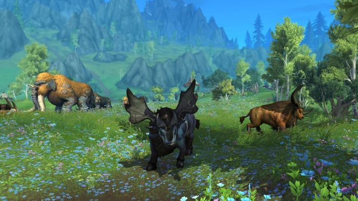 World of Warcraft: Dragonflight creatures in a grassy field