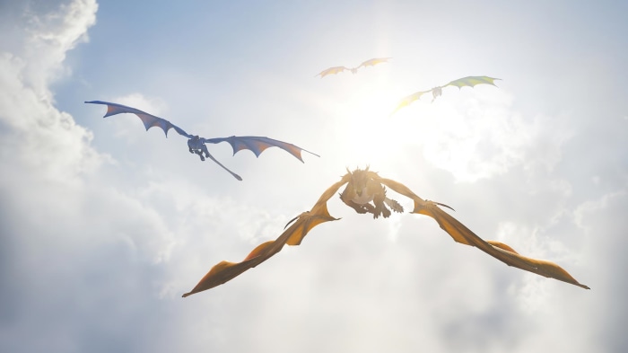 Dragons flying in the sky during the day