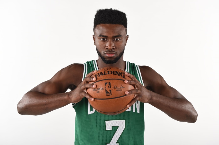 Jaylen Brown of the Boston Celtics holding a Spalding basketball