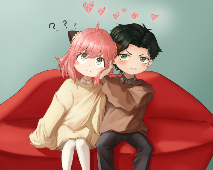 Anya Forger and Damian Desmond from Spy X Family sitting on a couch