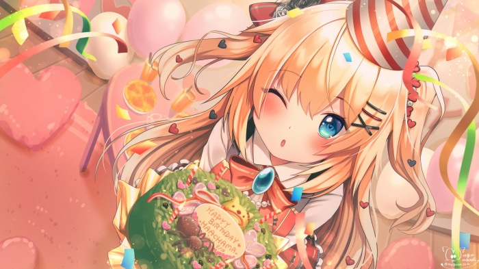 Akai Haato from Hololive with a birthday cake