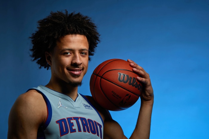 Cade Cunningham of the Detroit Pistons with a basketball