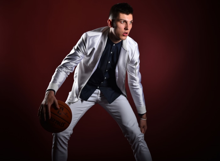 Tyler Herro with a basketball