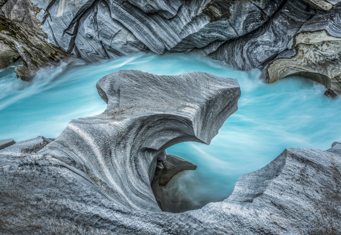 Turquoise river flowing through marble canyon