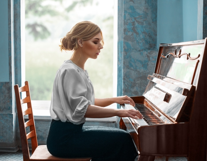 Nastya playing piano by Albert Lesnoy