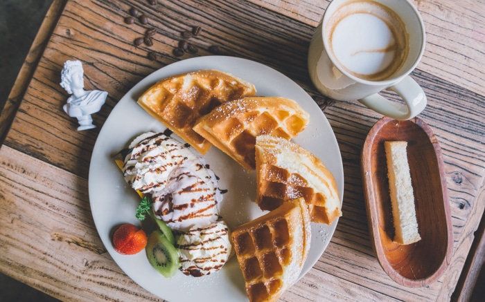 Waffles with ice cream and coffee