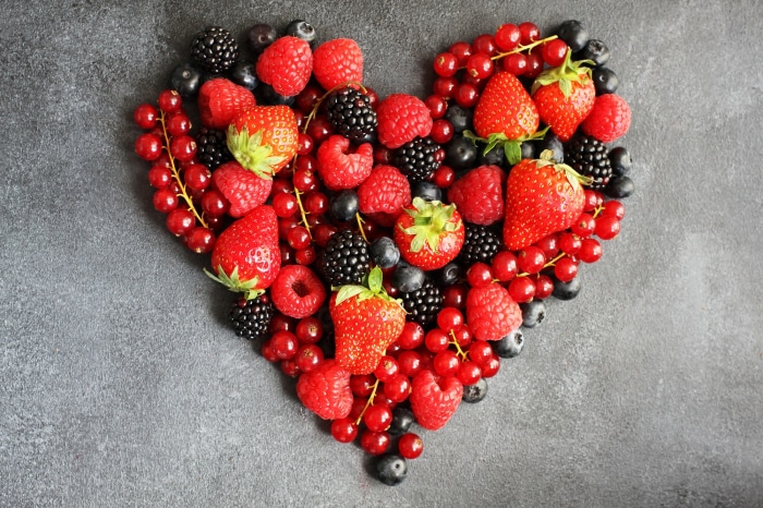 Heart-shaped arrangement of fresh berries