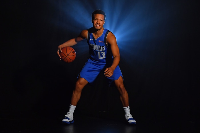 Jalen Brunson of the Dallas Mavericks dribbling a basketball