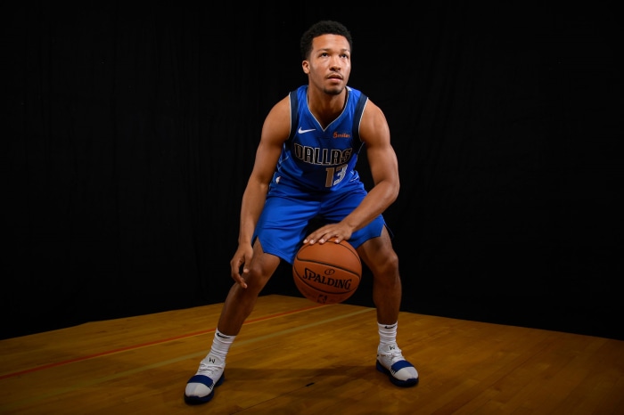 Jalen Brunson of Dallas Mavericks dribbling basketball