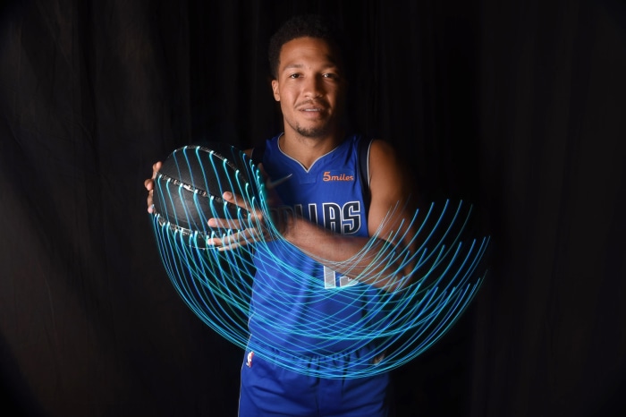 Jalen Brunson of the Dallas Mavericks with a basketball