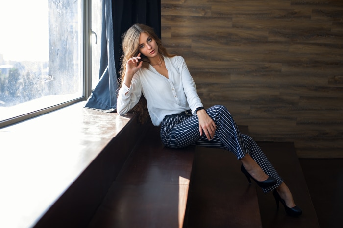 Stylish Model Posing by Window