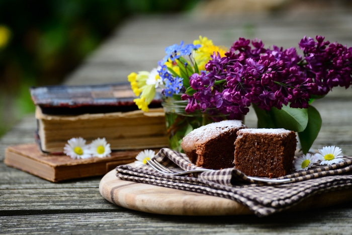Still Life Photography with Chocolate Cake and Flowers