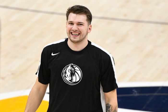 Luka Dončić wearing a Dallas Mavericks t-shirt