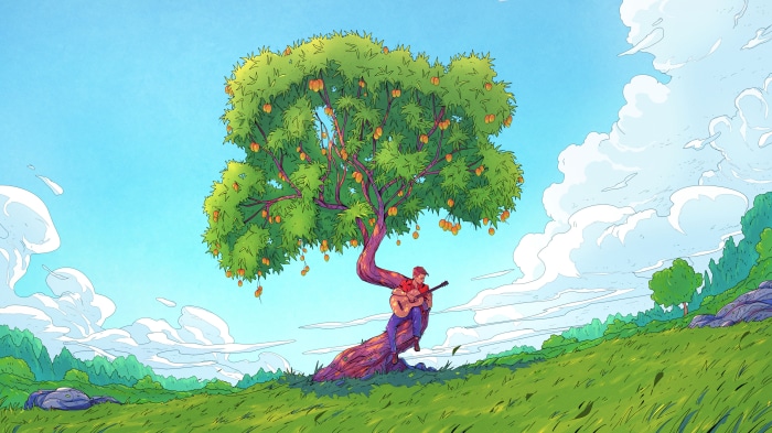 Man playing guitar under a fruit tree